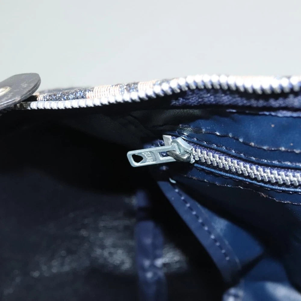 Interior view of the Dior Boston Bag vintage showing navy Trotter Canvas lining and zipper detail.