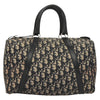 Vintage navy Dior Boston Bag made of Trotter Canvas, size 30 with black leather straps, produced in France.