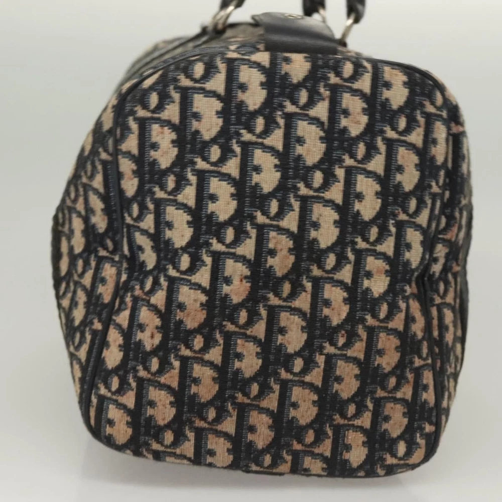 Back view of vintage Dior Boston Bag in navy Trotter Canvas, showcasing designer logo and texture.