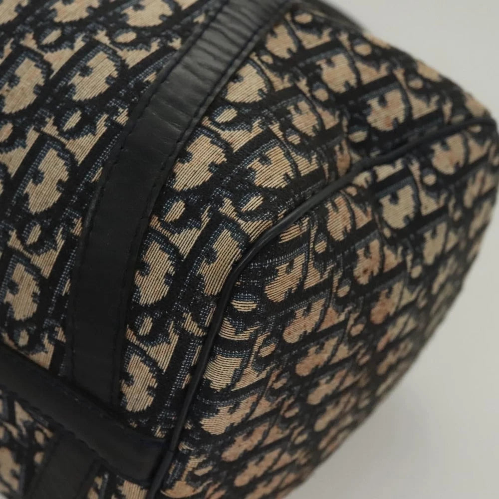 Close-up of vintage navy Dior Boston Bag made from Trotter Canvas, showcasing its unique pattern and texture.
