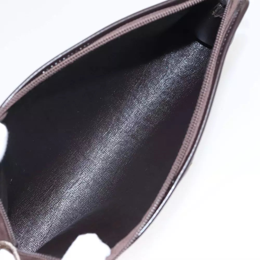 CHRISTIAN DIOR CLUTCH TROTTER CANVAS