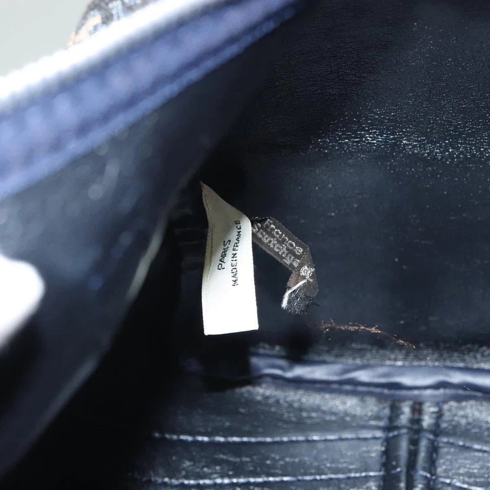 Interior view of Dior Boston Bag vintage showing label and lining details in navy Trotter Canvas.