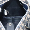  Interior view of Dior Boston Bag vintage showing label and lining details in navy Trotter Canvas.